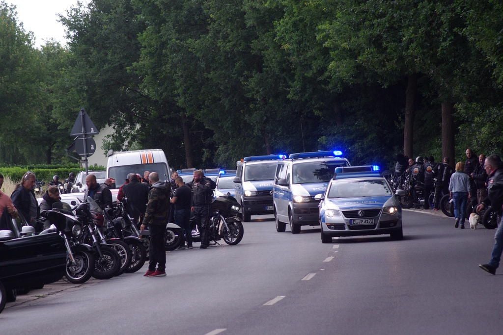 hells angels form a funeral procession with hundreds of motorcycles